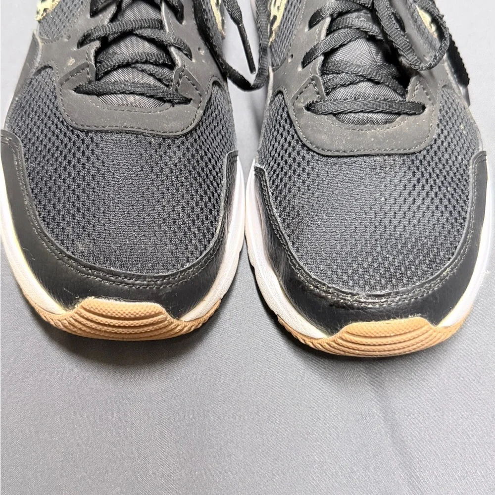 Nike Women's Black and Gold Leopard Sneakers